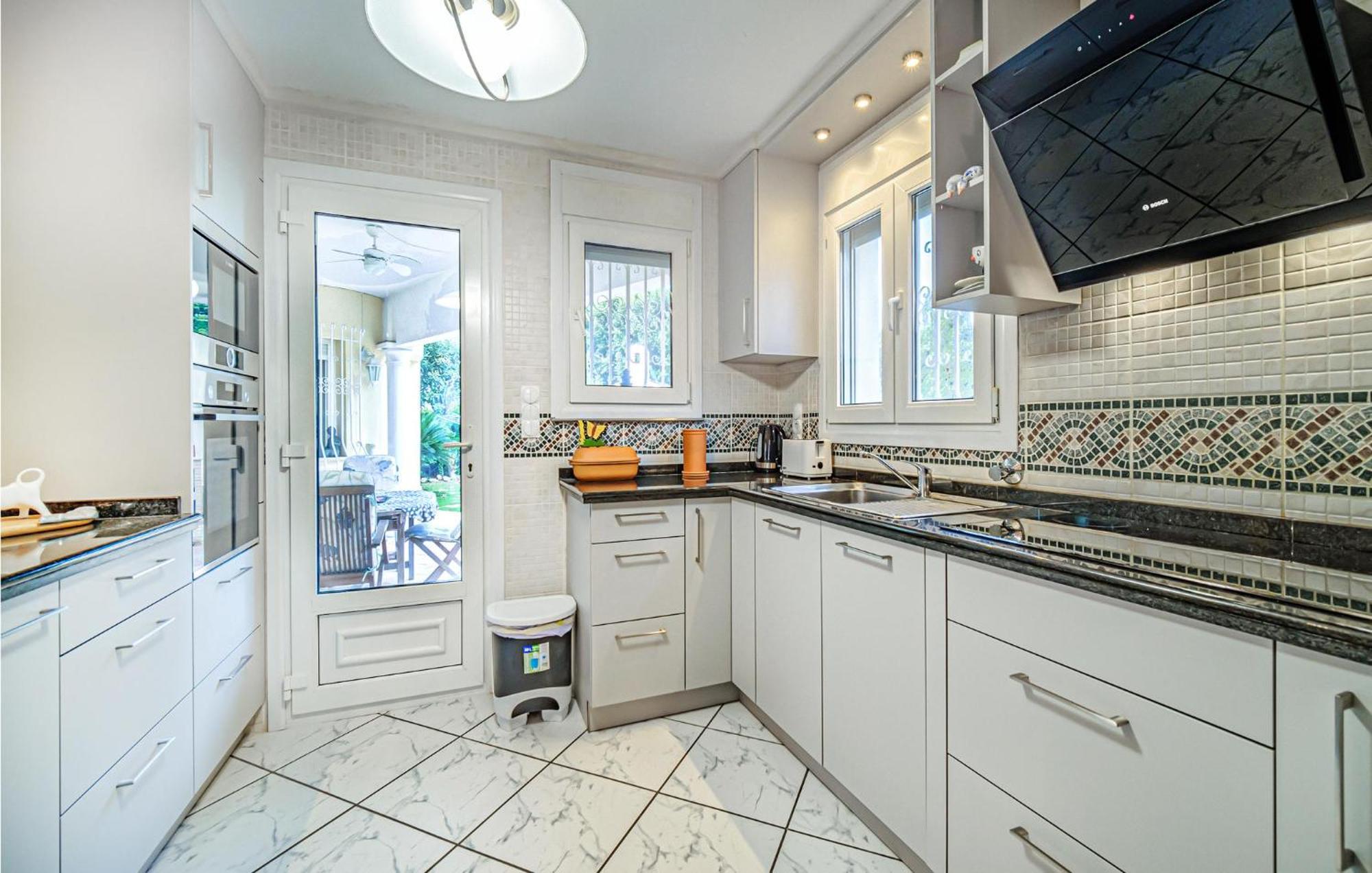Beautiful Home In Oliva With Kitchen Exterior photo